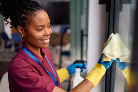 woman cleaning windows