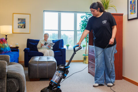 man vacuuming